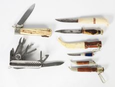 ALL STAINLESS STEEL POST-WAR SWISS ARMY TYPE POCKET KNIFE, with 15 implements to include; magnifying