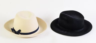 LADY'S WHITE FELT TRILBY HAT and a LADY'S CAROLINE CHARLES 100% WOOLFELT BLACK TRILBY HAT