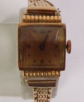 LADY’S 18CT GOLD WRISTWATCH, Swiss 15 jewel movement, square gilt Arabic dial, on a 9ct gold