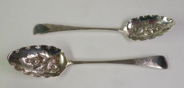 PAIR OF GEORGE III SILVER EARLY ENGLISH PATTERN TABLESPOONS, later enhanced as 'Berry' spoons, the