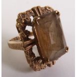 SMOKEY QUARTZ DRESS RING, an octagonal-cut smoky quartz within a textured frame, ring size F1/2, 6.