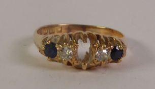 AN EDWARDIAN 18CT GOLD SAPPHIRE AND DIAMOND RING, a vacant central setting spaced by two old-cut