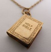 9ct GOLD FINE CHAIN NECKLACE AND 9ct GOLD ‘HOLY BIBLE’ PENDANT, 3.2gms (2)