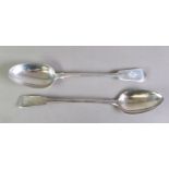 TWO FIDDLE PATTERN SILVER BASTING OR GRAVY SPOONS, one by William Eaton, London 1807, initialled,