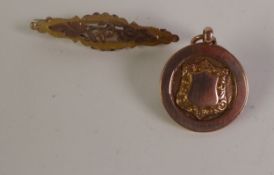 9CT GOLD SPORTS MEDALLION, converted into a brooch, 2.2cm diameter; and A LATE VICTORIAN