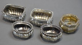 PAIR OF LATE VICTORIAN SILVER OBLONG SALT-CELLARS with gadrooned rims and demi-gadrooned bodies,