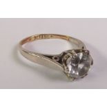 SOLITAIRE WHITE STONE RING, in a claw setting, marked ‘9CT & SIL’, ring size J, 2.3g