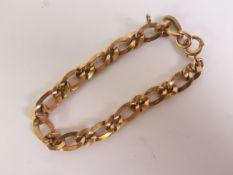 FANCY 9CT GOLD CURB LINK BRACELET, marked ‘9.375’, 21cm long, 27.6g