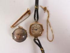 LADIES LIMIT CIRCA 1950's 9ct GOLD CASED WRIST WATCH, rounded oblong with circular Arabic dial,