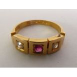 VICTORIAN 18CT GOLD RUBY AND DIAMOND RING, a cushion-cut ruby and two old-cut diamonds in square