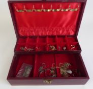 A QUANTITY OF GOLD PLATED AND SILVER JEWELLERY, including; chain necklaces, bangles and earrings, in