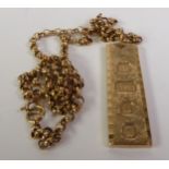 9CT GOLD INGOT PENDANT ON A 9CT GOLD BELCHER CHAIN, London 1977, ingot 4.5cm long, 22.9g