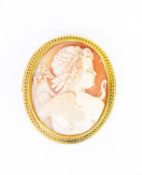 VICTORIAN WELL-CARVED OVAL SHELL CAMEO BROOCH depicting cupid with bow and quiver of arrows, in gold