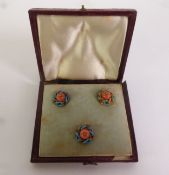 SET OF THREE VICTORIAN CORAL, DIAMOND AND ENAMEL DRESS STUDS, coral beads each inset with a rose-cut