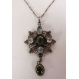 ARTS & CRAFTS SILVER MOONSTONE AND GREEN TOURMALINE PENDANT ON CHAIN, an oval-cut green tourmaline