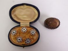 SET OF FIVE MOTHER-OF-PEARL, BLUE ENAMEL AND BLUE PASTE GILT METAL DRESS BUTTONS, in a fitted