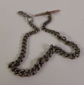 A SILVER GRADUATED CURB LINK ALBERT CHAIN, with gilt metal T-Bar and clip, 32cm long