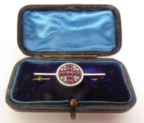 EARLY 20TH CENUTRY RUBY, DIAMOND AND WHITE ENAMEL ST GEORGE’S FLAG BROOCH, calibré-cut rubies and