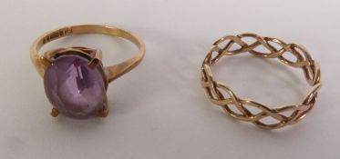 9CT GOLD WOVEN BAND RING, Birmingham 1979, ring size J; and a 9CT GOLD AMETHYST RING, London 1971,