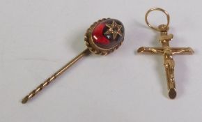 VICTORIAN GARNET AND DIAMOND STICK PIN, an oval garnet star set with a rose-cut diamond, 2.3g (pin