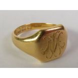 18CT GOLD SIGNET RING, with a monogrammed octagonal top, Birmingham 1920, ring size K1/2, 5.3g