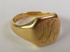 18CT GOLD SIGNET RING, with a monogrammed octagonal top, Birmingham 1920, ring size K1/2, 5.3g