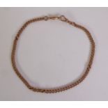 9ct GOLD CURB PATTERN CHAIN with watch clip to each end, each link marked, 13 1/2" long (34.