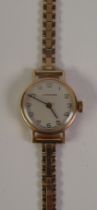 LONGINES, LADY'S SWISS 9ct GOLD BRACELET WATCH, with mechanical movement, circular silvered Arabic