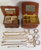 TWO WOODEN JEWELLERY CASKETS containing a quantity of gold plated chains, earring, bangles and a