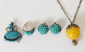 SUITE OF TURQUOISE BEAD SET JEWELLERY, viz a ring, a pair of clip earrings and a female figure