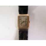 CIRCA 1930's GENTS 9ct GOLD CASED WRIST WATCH, oblong with Arabic dial having seconds subsidiary,