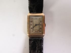 CIRCA 1930's GENTS 9ct GOLD CASED WRIST WATCH, oblong with Arabic dial having seconds subsidiary,