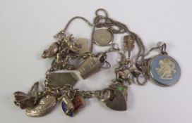 A SILVER CHAIN CHARM BRACELET, with padlock clasp and fourteen charms and A SILVER CHAIN NECKLACE