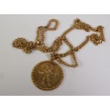 9CT GOLD ST CHRISTOPHER PENDANT ON A 9CT GOLD CUBAN LINK CHAIN, Birmingham 1976 and London 1977,