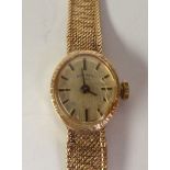 LADY’S 9CT GOLD ROTARY WRISTWATCH, silvered oval dial with batons, 17 jewel mechanical movement,