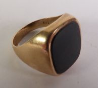 9ct GOLD SIGNET RING, set with oblong black onyx ,(tests 9ct) ring size R/S, 5.8gms