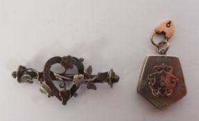 VICTORIAN SILVER BAR BROOCH, the heart shaped centre entwined with foliate and flowers, Chester
