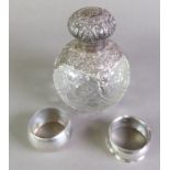 EDWARD VII PIERCED SILVER MOUNTED GLOBULAR CUT GLASS SCENT BOTTLE, with internal glass stopper and