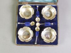 CASED SET OF FOUR LATE VICTORIAN OPEN SALTS AND SPOONS, Birmingham 1891, 1.33ozt, in a blue plush