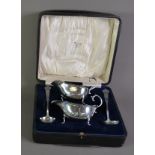 GEORGE VI CASED PAIR OF SILVER SAUCE BOAT AND TREFID LADLES BY WILLIAM HUTTON & Co Ltd, retailed