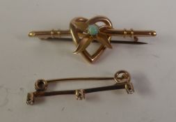 EDWARDIAN 15ct GOLD BROOCH the heart-shape centre set with an OPAL. Together with a gold colour