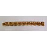 CIRCA 1970S 9CT GOLD BRACELET, of woven textured and brush polished links, import London 1974, 2cm