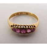 VICTORIAN 18CT GOLD RUBY RING, five graduated cushion-cut rubies in claw settings, Birmingham