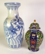 MODERN CHINESE GINGER JAR AND COVER, of panelled form, decorated in colours and gilt with stylised