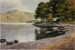 GEOFFREY H POOLEY (b.1908) WATERCOLOUR Lake scene with beach in foreground Signed and dated 1979