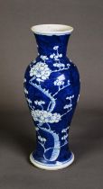 NINETEENTH CENTURY CHINESE BLUE AND WHITE PORCELAIN VASE, of slender baluster form, decorated with
