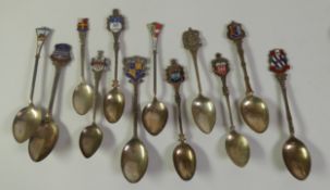 SEVEN SILVER SOUVENIR SPOONS WITH ENAMELLED TOPS, together with ANOTHER, EDINBURGH, not enamelled,
