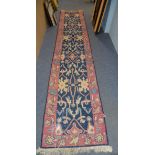 EASTERN TRIBAL HEAVY FLAT WEAVE RUNNER with large repeat medallion pattern on a dark blue field,