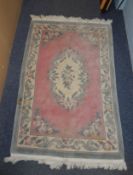 HEAVY QUALITY SUPER WASHED CHINESE EMBOSSED RUG OF AUBUSSON DESIGN, with plain rose pink field,