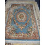 HEAVY QUALITY EMBOSSED WASHED CHINESE CARPET OF AUBUSSON DESIGN, with sky blue field with off-